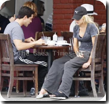 Sophie Monk talking in her mobile phone after putting out the trash near her home.A scar is visible on her right hip, as a result from a car accident earlier this year (10)Los Angeles.