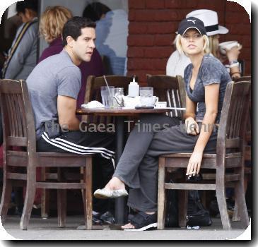 Sophie Monk talking in her mobile phone after putting out the trash near her home.A scar is visible on her right hip, as a result from a car accident earlier this year (10)Los Angeles.