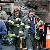 Mike Lombardi and Steven Pasquale
smoking while on the set of 'Rescue Me' filming in Harlem
New York City, USA.