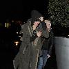 Agyness Deyn arriving at Bungalow 8 nightclub with a female friend. In her rush to get inside the club, Aggy slipped on the wet pavement and almost fell over, which she and her friend found hilarious London.
