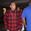 Chris Brown dines at Morels in the Grove and tastes a  P.O.M antioxidant tea drink in Hollywood Los Angeles.