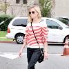 Reese Witherspoon leaving a restaurant in Brentwood while wearing a striped sweater Los Angeles.