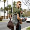 Kellan Lutz out and about in Beverly Hills while carrying a brown messenger bag Los Angeles.