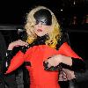 Joanne Stefani Germanotta aka Lady GaGa looks more like a robot than a pop star, as she arrives back at her London hotel just after 1.30am, having performed at the 02 Arena earlier in the evening. GaGa was wearing ripped fishnet stockings, a black visor shaped mask across her face and forehead, and a small video camera mounted on her red and black outfit, which she held in place to finish off the bizarre look!
 London, England.