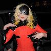 Joanne Stefani Germanotta aka Lady GaGa looks more like a robot than a pop star, as she arrives back at her London hotel just after 1.30am, having performed at the 02 Arena earlier in the evening. GaGa was wearing ripped fishnet stockings, a black visor shaped mask across her face and forehead, and a small video camera mounted on her red and black outfit, which she held in place to finish off the bizarre look!
 London, England.