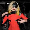 Joanne Stefani Germanotta aka Lady GaGa looks more like a robot than a pop star, as she arrives back at her London hotel just after 1.30am, having performed at the 02 Arena earlier in the evening. GaGa was wearing ripped fishnet stockings, a black visor shaped mask across her face and forehead, and a small video camera mounted on her red and black outfit, which she held in place to finish off the bizarre look!
 London, England.