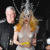 Lady Gaga arriving at Mr Chow restaurant in London, wearing a see-through plastic dress and a silver lobster headpiece following the final London date on her Monster Ball tour 
London, England.