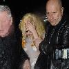 Lady Gaga arriving at Mr Chow restaurant in London, wearing a see-through plastic dress and a silver lobster headpiece following the final London date on her Monster Ball tour 
London, England.