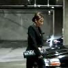 Victoria Beckham arriving at Palihouse in West Hollywood with three young men, carrying a black clutch Los Angeles.