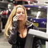 Kerry Katona
seen talking on her phone as she returns to her car after shopping.
Liverpool, England.