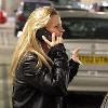 Kerry Katona
seen talking on her phone as she returns to her car after shopping.
Liverpool, England.