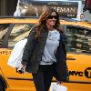 Kelly Bensimon, star of 'The Real Housewives of New York City',
seen shopping in Soho having bought a new laptop form the Apple Store.
New York City, USA.