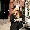 Courtney Love out and about in Soho wearing pajamas and smoking a cigarette New York City.