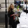 Fearne Cotton
 seen leaving the Radio 1 studios carrying a bunch of flowers.
London, England.