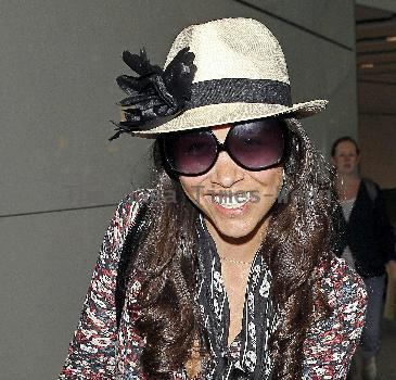 Manager Jonathan Shalit, Myleene Klass and daughter Ava Bailey
Myleene Klass arriving at Heathrow airport with her daughter and manager on a flight from Los Angeles 
London, England.