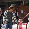 Larry Birkhead 
playing with his daughter, Dannielynn Birkhead, at a park
Los Angeles, California.