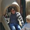 Larry Birkhead 
playing with his daughter, Dannielynn Birkhead, at a park
Los Angeles, California.