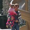 Larry Birkhead 
playing with his daughter, Dannielynn Birkhead, at a park
Los Angeles, California.