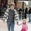 Larry Birkhead 
playing with his daughter, Dannielynn Birkhead, at a park 
Los Angeles, California.