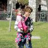 Larry Birkhead 
playing with his daughter, Dannielynn Birkhead, at a park 
Los Angeles, California.