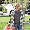 Larry Birkhead 
playing with his daughter, Dannielynn Birkhead, at a park 
Los Angeles, California.