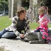 Larry Birkhead 
playing with his daughter, Dannielynn Birkhead, at a park 
Los Angeles, California.