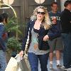 Cougar Town' star Busy Phillips carrying large shopping bags while out shopping at The Grove. 
Los Angeles, California.