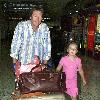 Australian cricketer Glenn McGrath arrives into Sydney International Airport on a late flight and is greeted by his daughter.
Sydney, Australia.