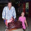 Australian cricketer Glenn McGrath arrives into Sydney International Airport on a late flight and is greeted by his daughter.
Sydney, Australia.