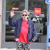 Gary Busey leaving Wells Fargo bank in Malibu
Los Angeles, California.