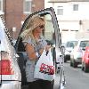 Kerry Katona brings shopping to her mother's house, including dog food, toilet paper and cans of cider from Bargain Booze Warrington.