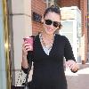 Bree Turner carrying a small Barney's shopping bag and drinking coffee while out and about in Beverly Hills
Los Angeles, Califlrornia.