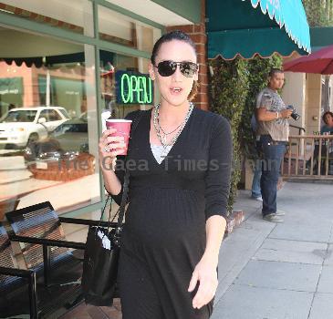 Bree Turner carrying a small Barney's shopping bag and drinking coffee while out and about in Beverly Hills
Los Angeles, Califlrornia.