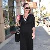 Bree Turner carrying a small Barney's shopping bag and drinking coffee while out and about in Beverly Hills
Los Angeles, Califlrornia.