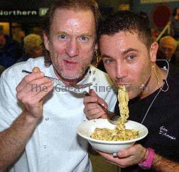 Celebrity Chef Gino D'Acampo
cooking fettuccine carbonara at Connswater Shopping Centre during the Great Belfast Menu culinary challenge as part of the first ever 'Great Belfast Food Week'.
Belfast, Northern Ireland.