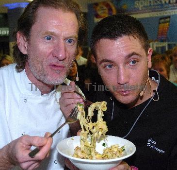 Celebrity Chef Gino D'Acampo
cooking fettuccine carbonara at Connswater Shopping Centre during the Great Belfast Menu culinary challenge as part of the first ever 'Great Belfast Food Week'.
Belfast, Northern Ireland.