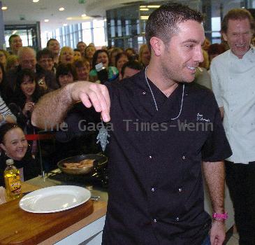 Celebrity Chef Gino D'Acampo
cooking fettuccine carbonara at Connswater Shopping Centre during the Great Belfast Menu culinary challenge as part of the first ever 'Great Belfast Food Week'.
Belfast, Northern Ireland.