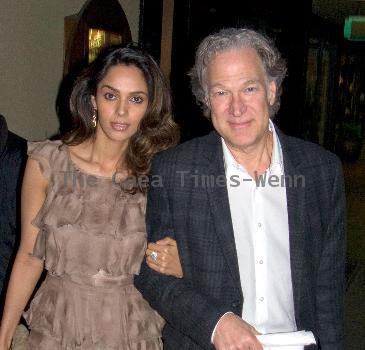 Bollywood Superstar Mallika Sherawat and Hollywood Mogul CEO of Village
Roadshow Michael Lambert leaving Vibrate Grill Jazz Club.
Beverly Hills, California - 25.03.10
***no TMZ, no Access Hollywood Credit: IANS- WENN