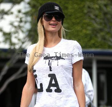 Paris Hilton and a friend depart Fred Segal in West Hollywood. Los Angeles.