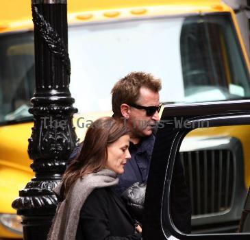 Anthony LaPaglia and his wife Gia Carides depart their hotel New York City.