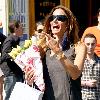 Kelly Bensimon
'The Real Housewives of New York City' cast member is presented with flowers from photographers as she leaves Pastis after having lunch with a friend
New York City, USA.