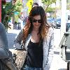 Rachel Bilson wearing torn jeans leaves a restaurant in Hollywood. Los Angeles.