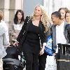 Jennifer Ellison carrying her son Bobby in a baby carrier while out and about
Liverpool, England.