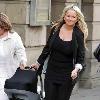 Jennifer Ellison carrying her son Bobby in a baby carrier while out and about
Liverpool, England.