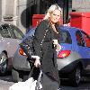 Jennifer Ellison carrying her son Bobby in a baby carrier while out and about
Liverpool, England.