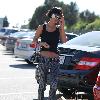 Bai Ling leaving Neil George Salon carrying a bag full of hair products.
Los Angeles, California.