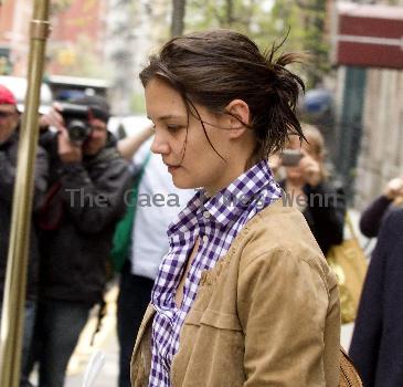 Katie Holmes 
leaving a Manhattan hotel carrying a shopping bag from Bloomingdale's
New York City, USA.