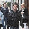 Musician Noel Gallagher 
of Oasis, shops at a grocery supermarket on Marlybone High Street. Afterwards, Noel looks for a bargain in the shop window of Oxfam Books & Music store 
London, England.