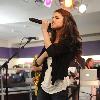 Selena Gomez 
performing live at the HMV store in Oxford Street.
London, England.