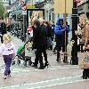 Yummy Mummy and ITV's 'Trial & Retribution' actress Victoria Smurfit seen carrying a Dunnes Stores bag and encouraging her daughter Evie Dorothy Baxter to give money to the buskers outside the St Stephens Green Shopping Centre.
Dublin, Ireland.